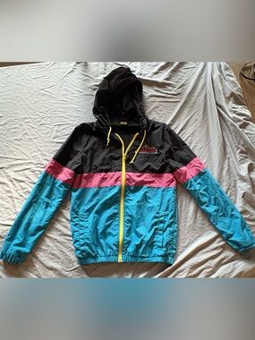 Universal Studios Colorblock Hooded Windbreaker in Black, Pink & Teal